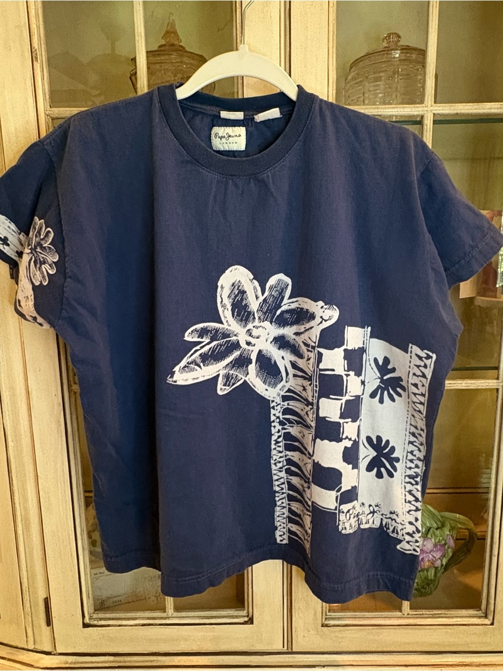 Pepe Jeans Navy Tee with bold White Floral Print in 90s retro skate style
